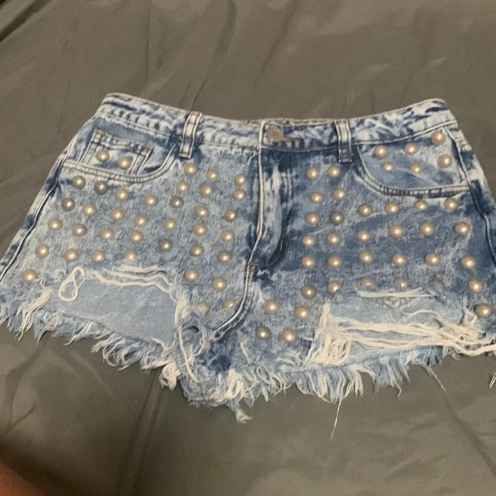 "Boom Boom Denim Shorts: Size 11. Embellished with Stylish Details.